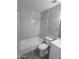Remodeled bathroom with shower-tub combination and updated sink at 4043 W Palomino Rd, Phoenix, AZ 85019