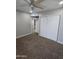 Spacious bedroom with ceiling fan and carpeted flooring at 4043 W Palomino Rd, Phoenix, AZ 85019