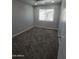 Bedroom featuring a window and a ceiling fan at 4043 W Palomino Rd, Phoenix, AZ 85019