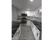 Updated kitchen featuring stainless steel appliances, white cabinets, subway tile backsplash, and gorgeous black-and-white counters at 4043 W Palomino Rd, Phoenix, AZ 85019