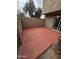 Outdoor patio with desert landscaping, a privacy wall, and access to the unit through a sliding door at 4043 W Palomino Rd, Phoenix, AZ 85019