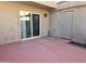 Private patio featuring neutral stucco wall and red tiled flooring at 4043 W Palomino Rd, Phoenix, AZ 85019
