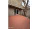 Private outdoor patio with desert landscaping and exterior access to the back of the unit at 4043 W Palomino Rd, Phoenix, AZ 85019