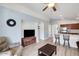 Bright and airy living space featuring stylish decor, an open layout, and seamless flow to the kitchen at 41341 W Little Dr, Maricopa, AZ 85138
