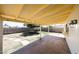 Covered patio with view of the backyard and block fence at 4153 W Sunnyside Ave, Phoenix, AZ 85029