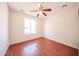 Bedroom with a ceiling fan and a window providing natural light at 4153 W Sunnyside Ave, Phoenix, AZ 85029