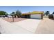 Charming single-story brick home with a well-maintained, low maintenance rock front yard at 4153 W Sunnyside Ave, Phoenix, AZ 85029