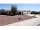 Charming single-story brick home with a well-maintained, low maintenance rock front yard at 4153 W Sunnyside Ave, Phoenix, AZ 85029
