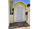 A yellow shed with a white door and a security light is in the backyard of the property at 4153 W Sunnyside Ave, Phoenix, AZ 85029