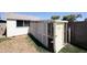 Exterior view of the backyard storage shed, featuring lattice and The Breakfast Club sign at 4153 W Sunnyside Ave, Phoenix, AZ 85029