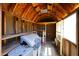 Inside the shed, featuring a grill, shelving, and natural wood finishes at 4153 W Sunnyside Ave, Phoenix, AZ 85029