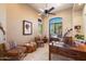 Cozy office space with natural light, a ceiling fan, and custom wood furnishings at 41910 N Long Cove Way, Anthem, AZ 85086