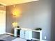 Bedroom featuring decor and a white desk with drawers for ample storage at 4750 N Central Ave # M2, Phoenix, AZ 85012