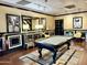 Well-appointed billiards room with pool table, stylish decor, and game-playing ambiance at 4750 N Central Ave # M2, Phoenix, AZ 85012