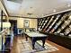 Well-appointed billiards room with pool table, built-in shelving, and stylish decor at 4750 N Central Ave # M2, Phoenix, AZ 85012