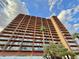 High-rise condominium featuring private balconies and palm tree landscaping at 4750 N Central Ave # M2, Phoenix, AZ 85012