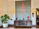 Stylish foyer with modern console table, decorative accents, and elegant lighting at 4750 N Central Ave # M2, Phoenix, AZ 85012