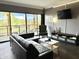 Inviting living room features a sliding glass door with scenic outdoor views and modern furnishings at 4750 N Central Ave # M2, Phoenix, AZ 85012