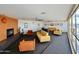 Spacious living room with fireplace, stylish seating, and scenic view at 4750 N Central Ave # M2, Phoenix, AZ 85012