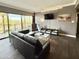 Inviting living room features a sliding glass door with scenic outdoor views and modern furnishings at 4750 N Central Ave # M2, Phoenix, AZ 85012