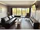 Inviting living room features a sliding glass door with scenic outdoor views and modern furnishings at 4750 N Central Ave # M2, Phoenix, AZ 85012