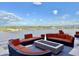 Inviting rooftop deck with comfortable seating, fire pit, and panoramic city views at 4750 N Central Ave # M2, Phoenix, AZ 85012