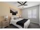 Cozy bedroom has a comfortable bed, neutral walls, and decorative accents at 4904 E Tierra Buena Ln, Scottsdale, AZ 85254