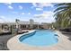 Resort style pool with a hot tub, patio furniture, and mature landscaping at 4904 E Tierra Buena Ln, Scottsdale, AZ 85254