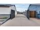 Long driveway extending back behind a gate into a concrete drive at 5228 W Aster Dr, Glendale, AZ 85304