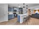 Modern kitchen with stainless steel appliances, white countertops, and shaker cabinets at 5228 W Aster Dr, Glendale, AZ 85304