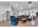 Bright, open living room featuring a comfortable sectional sofa and modern decor at 5228 W Aster Dr, Glendale, AZ 85304