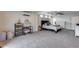 Spacious main bedroom featuring plush carpeting, a ceiling fan, furniture, and decor at 5228 W Aster Dr, Glendale, AZ 85304