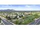 Stunning aerial view overlooking the neighborhood, with a golf course and mountain backdrop at 6007 N 79Th St, Scottsdale, AZ 85250