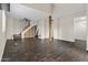 Spacious basement featuring tile floors, a ceiling fan, and stairs leading to the upper level at 6007 N 79Th St, Scottsdale, AZ 85250