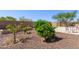 A lush backyard landscape provides a tranquil setting to sit at an outdoor table and enjoy the open air at 6125 E Hodges St, Cave Creek, AZ 85331