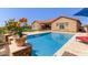 Stunning pool area showcasing the home's architecture, outdoor living space, and landscaped surroundings at 6125 E Hodges St, Cave Creek, AZ 85331