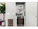 Convenient bar area with wine storage, adding a touch of elegance and functionality at 6608 W Saguaro Park Ln, Glendale, AZ 85310