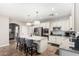 Beautiful kitchen with granite countertops, stainless steel appliances, and ample cabinet space at 6608 W Saguaro Park Ln, Glendale, AZ 85310