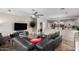 Spacious living area open to the kitchen, featuring modern decor and a cozy atmosphere at 6608 W Saguaro Park Ln, Glendale, AZ 85310