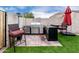 This outdoor kitchen boasts stainless steel appliances and bar stool seating at 6608 W Saguaro Park Ln, Glendale, AZ 85310