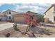 Inviting single Gathering home featuring desert landscaping, flowering cacti and a two car garage at 6777 W Tether Trl, Peoria, AZ 85383
