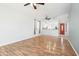 Open living area with wood floors, natural light, and seamless access to the kitchen area at 6777 W Tether Trl, Peoria, AZ 85383