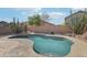 Desert home featuring a private pool surrounded by mature desert landscaping at 6777 W Tether Trl, Peoria, AZ 85383