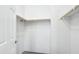 Empty walk-in closet with door, shelf and bar at 6777 W Tether Trl, Peoria, AZ 85383