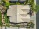 Birds-eye view of the home featuring skylights, landscaping, and covered patio at 6920 W Via Montoya Dr, Glendale, AZ 85310