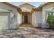 Front exterior view of the home featuring a desert landscape at 6920 W Via Montoya Dr, Glendale, AZ 85310