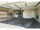 An attached two-car garage featuring built-in storage, utility sink, and interior access to the home at 6920 W Via Montoya Dr, Glendale, AZ 85310