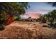 Expansive backyard during sunset, perfect for outdoor gatherings and recreation at 7039 N 15Th St, Phoenix, AZ 85020