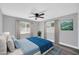 Stylish bedroom featuring a ceiling fan, soft natural light, and neutral tones at 7039 N 15Th St, Phoenix, AZ 85020