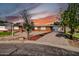 Inviting brick home features desert landscaping, mature trees, and a convenient driveway at 7039 N 15Th St, Phoenix, AZ 85020